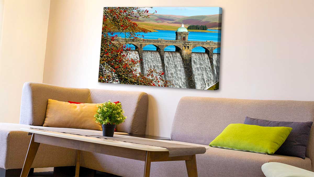 Capture of an Elan Valley damn printed onto canvas and then hung over a modern settee