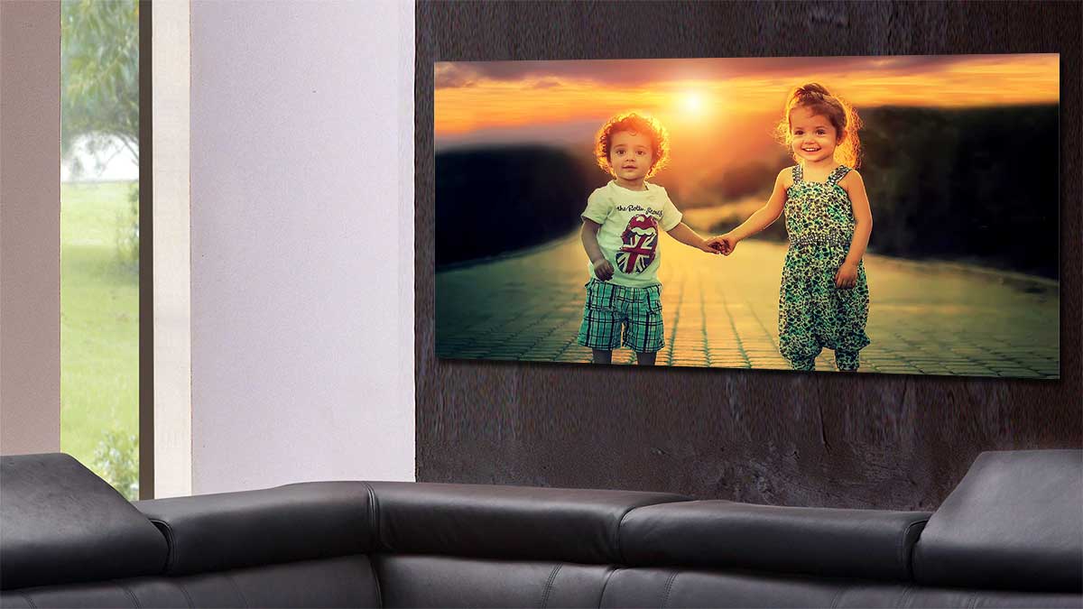 Print of a panoramic photo with two children standing in the sunset holding hands