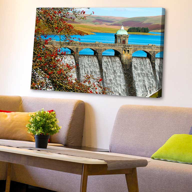 Capture of an Elan Valley damn printed onto canvas and then hung over a modern settee