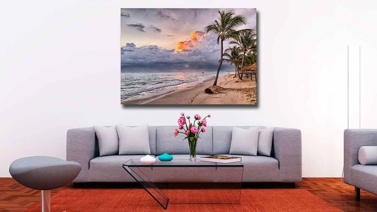 Poster of a tropical sunset featuring a beach with palm trees