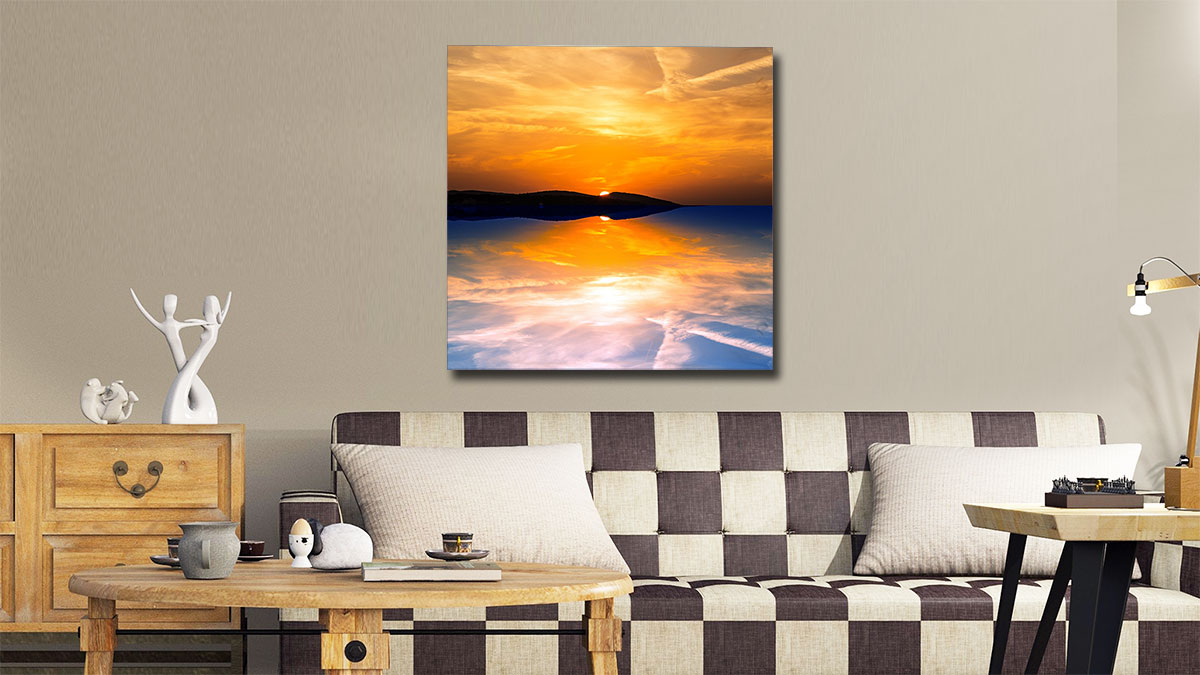 Digital art of a sunset over an island lagoon hung in a esoterically decorated sitting room 