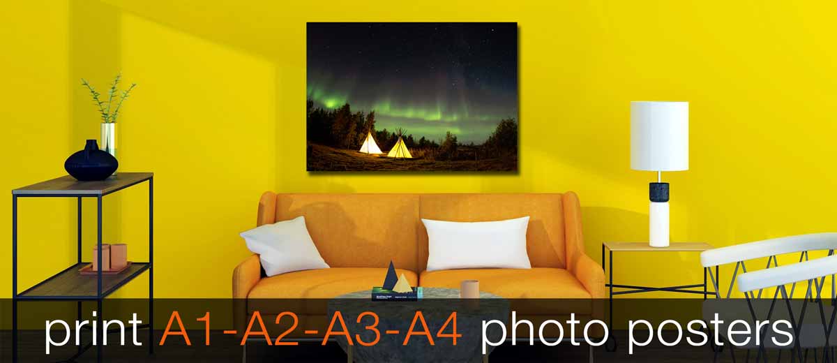 Camping picture featuring the northern lights printed on an A1 poster on a dramatic yellow wall