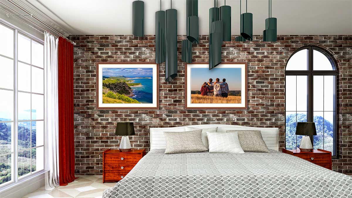 two A2 framed photos hung on a bedroom wall