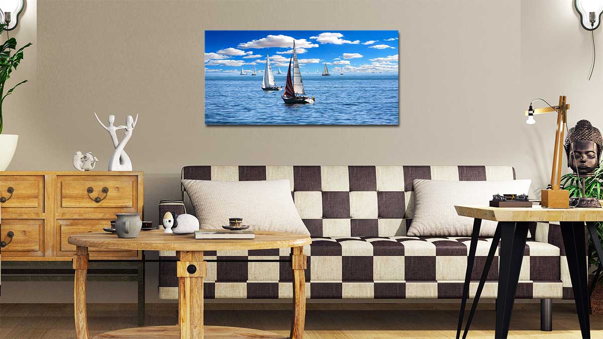 Poster of sailboats hung in an artistically decorated front room