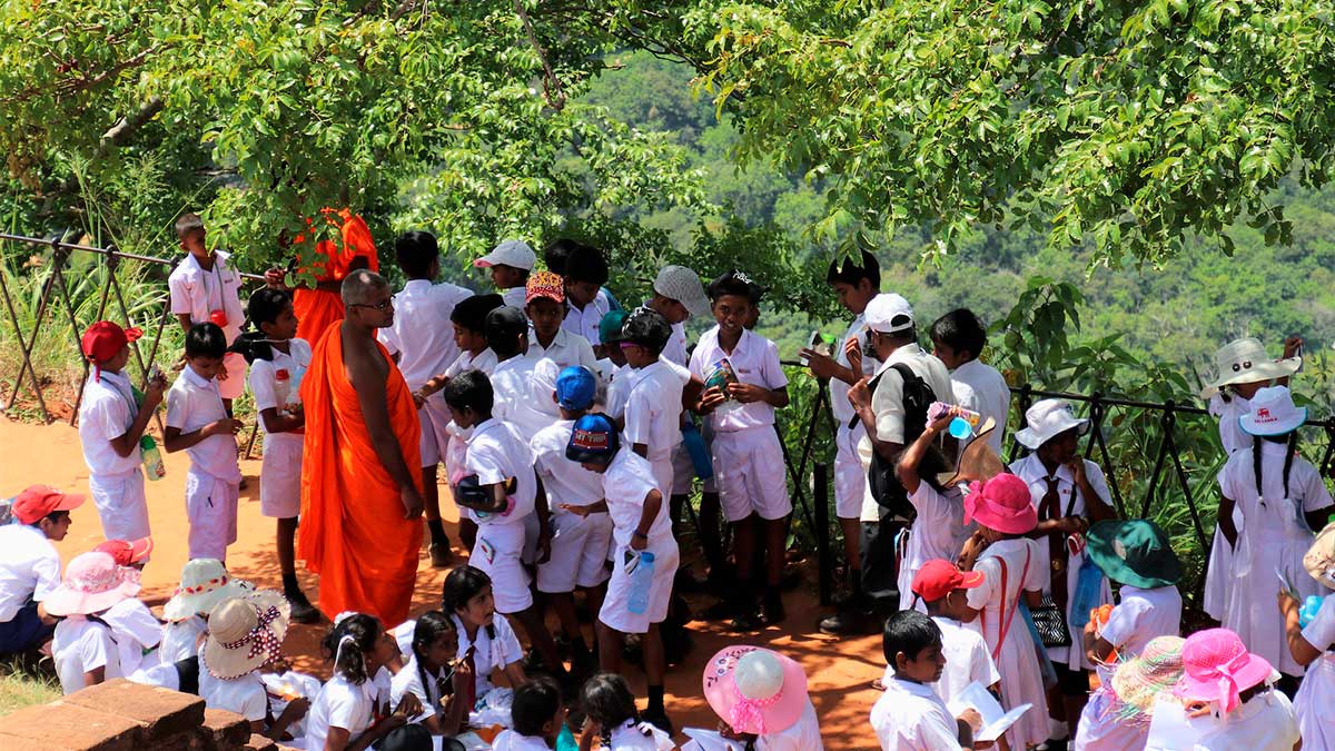 image showing a group of children with the boys in shadow and the girls in sunlight