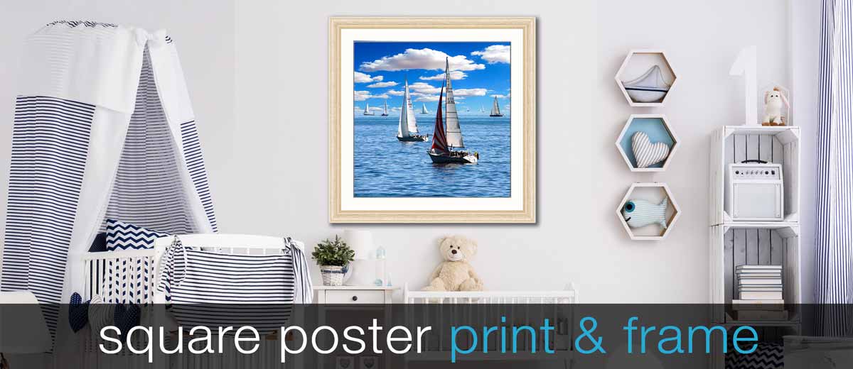 Nursery with a picture of sailing boats with beautiful blue sea snd sky with fluffy clouds in a square frame