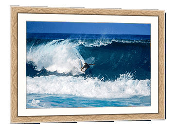 Dramatic surfing picture in a frame